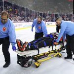 nhl-referee-stretchered-off-ice-and-taken-to-hospital-after-collision