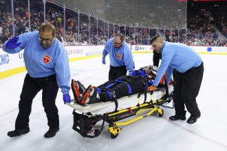 nhl-referee-stretchered-off-ice-and-taken-to-hospital-after-collision